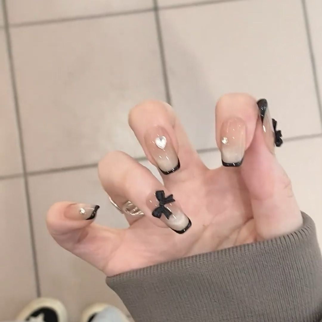 French style handmade press-on nail with black bow